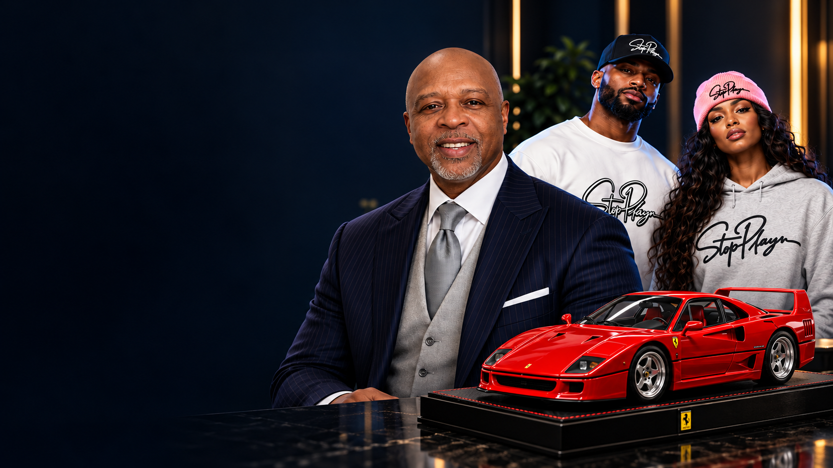 StopPlayn founder Lee V. Putney with adult signature apparel models and a red Ferrari F40 collector scale model